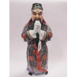 Oriental - Chinese pottery figure of bearded gentleman, circa early to mid XX century, his hands