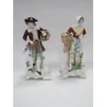 Pair of Italian Capo di Monte Porcelain Figurines, circa mid XX Century, she holding basket and dead