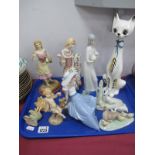 Ukranian Figure of Seated Lady, 21cm high, larger cat probably Italian, Nao and other figurines:-