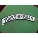 Yorkshireman Metal Wall Sign, of lunar form in the Railway Manner, 51cm wide.