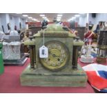 Green Onyx Cased Mantle Clock, of architectural form, featuring brass pillars, gilt dial, eight