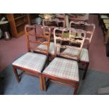 A Set of Four Early XX Century Mahogany Ladder Back Dining Chairs, drop in seats, on chamfered legs,