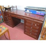 A Chinese Hardwood Pedestal Desk, with brushing slides, central drawers, flanking pedestals, with