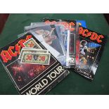 Assortment of ACDC Signatures and Programmes, includes signed photograph of all five members (with