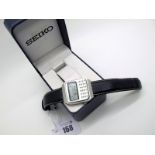 Seiko; A Calculator Quartz Wristwatch, C153-5007, numbered "834230, on a strap, in a Seiko box.