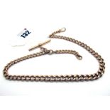 A Rose Gold Graduated Curb Link Albert Chain, links stamped, to single swivel style clasp (