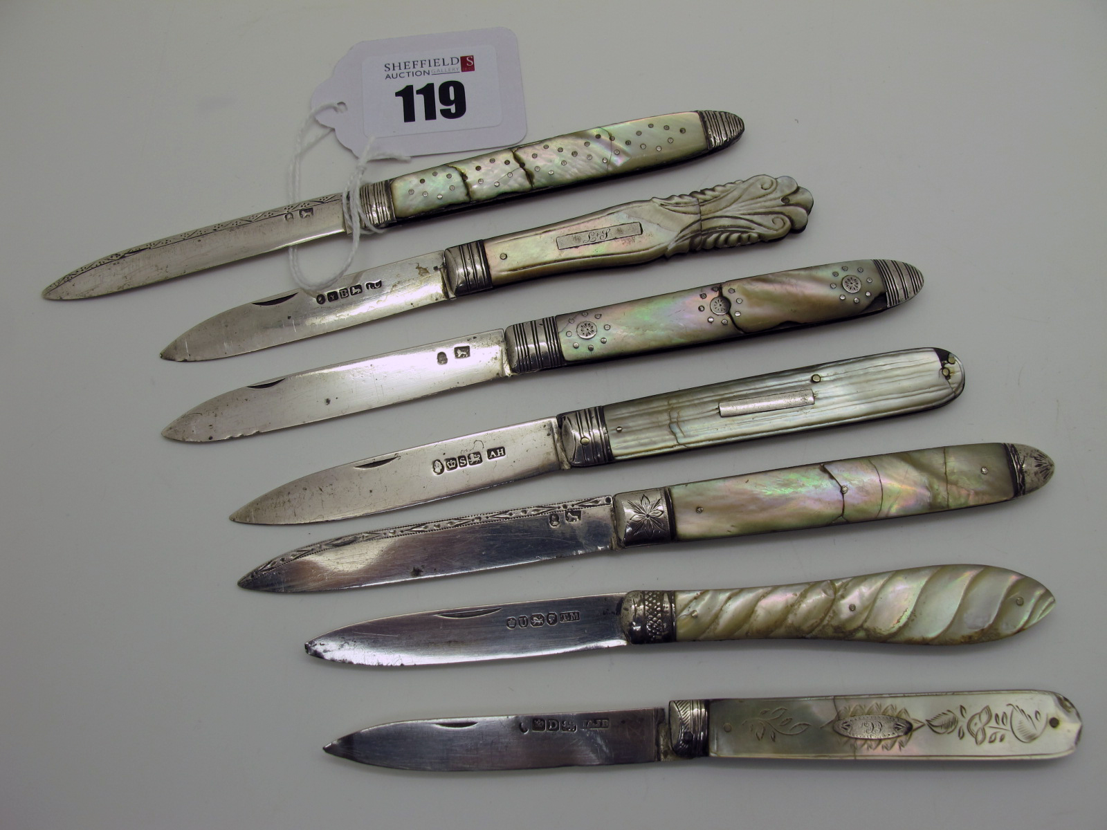 A Collection of Seven Hallmarked / Part Hallmarked Silver and Mother of Pearl Folding Fruit