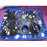 Costume Jewellery, including bangles, bead necklaces, etc :- One Tray