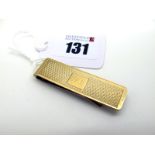 A 9ct Gold Money Clip, engine turned decoration and engraved initials "DRB", overall length 5cm (