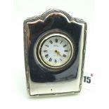 A Modern Hallmarked Silver Mounted 'Concorde' Bedside Clock, the R Carr signed dial with black Roman