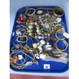 A Mixed Lot of Assorted Costume Jewellery, including gilt bangles etc :- One Tray