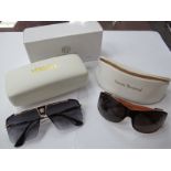 A Pair of Versace Sunglasses, cased and boxed; plus a pair of Vivienne Westwood sunglasses,