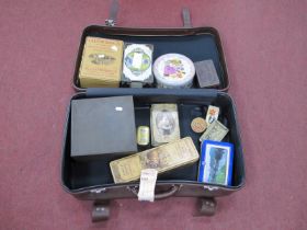 A Brown Suitcase, containing tins, comprising of Thornes Toffee, Glenmorangie Whisky, The Balkan