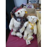 Steiff Winter Bear, 32cm tall and Millennium White Bear 30cm tall, both with ear stud and label. (
