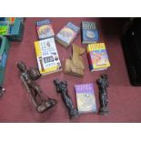 Wooden Aboriginal Figures,with a collection of J.K Rowling Harry Potter books:- One Tray,