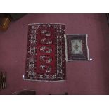 XX Century Persian Style Wool Prayer Mat, 63 x 50cm, together with a Persian style rug, with a red