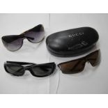 Three Pairs of Gucci Sunglasses (one with case), worn condition. (3) [520143 [137242]