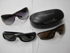 Three Pairs of Gucci Sunglasses (one with case), worn condition. (3) [520143 [137242]