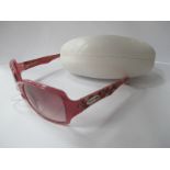 A Pair of Emilio Pucci Sunglasses, pink plastic frames (cased). [700894]