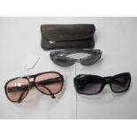 A Pair of Georgio Armani Sunglasses (cased); plus two further pairs by the same designer, worn