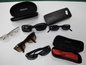 Four Pairs of Designer Sunglasses, including Chanel, Gucci, Fendi, Ray-Ban and one other, two with