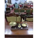 A Set of Victorian Brass Shop Scales on mahogany base, 40.5cm wide; plus a set of weights.