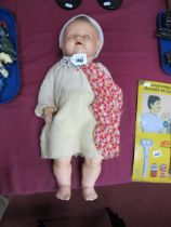An Early XX Century Bisque Head Doll, the back of the head marked 'Made in Germany H.W. 7?',