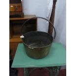 XIX Century Large Brass Jam Pan, with iron loop handle, approximately 39.5cm diameter.