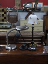 An Early XX Century Tall Lamp with wooden base and white glass shade decorated with butterflies,