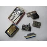 Novelty Lighters, including K.K.W. camera (2), Crown, musical, Jersey boat, Imco pistol type. (6) [