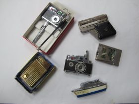 Novelty Lighters, including K.K.W. camera (2), Crown, musical, Jersey boat, Imco pistol type. (6) [