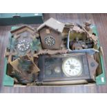 Two Wooden Cuckoo Clocks, with weights and carved wooden decoration, with one other clock, and box