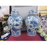 Pair of Chinese Style Blue-White Vases, decorated with fish and floral decoration (2), 54cm high.