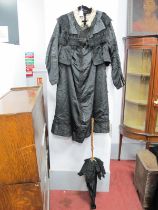 A Victorian Ladies Mourning Moire Taffeta Skirt and Jacket, with jet beading to skirt and a parasol;