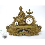 A Late XIX Century Mantle Clock, the gilt metal case of elaborate rectangular form with a seated