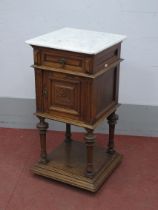 A XIX Century Oak Continental Bedside Cabinet, with grey marble top over a single drawer, panelled