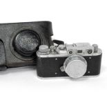 A Zopkuu Camera 'Zorki' Russian No 573217, 1:3.5 f=50mm, No 121411, in leather