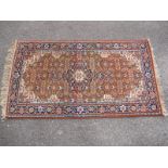 A Khorasan Wool Carpet, the centre with large medallion within geometric and floral border in mainly