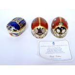 Three Royal Crown Derby Porcelain Paperweights; 'Millennium Bug', with certificate, 'Ladybird -