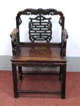 A XIX Century Chinese Hardwood Armchair, with a shaped top rail, pierced splat and solid seat with