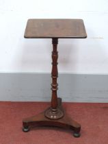 A XIX Century Mahogany Pedestal Table, with rectangular top, on turned pedestal and trefoil base