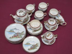 An Early XX Century Japanese Pottery Satsuma Tea Service, each piece decorated with pagodas in river