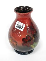 A Moorcroft Pottery Vase, of ovoid form, painted in a flambé 'Spring Flowers' pattern, impressed