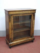 A Mid XIX Century Walnut Pier Cabinet, with inlaid frieze over a glazed door and two internal