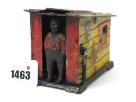 A Late XIX Century Mechanical Cast Iron Money Box Cast as an African Gentleman Standing in the