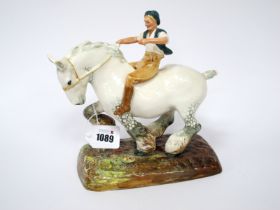 A Royal Doulton Pottery Figure 'Farmer's Boy', HN 2520, designed by W.M. Chance, issued 1938-1960,