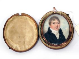 A Portrait Miniature of a Gentleman, wearing a white shirt and black jacket, unsigned on ivory,