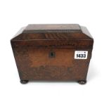 A Mid XIX Century Rosewood Tea Caddy, of two handled sarcophagus form raised on bun feet, inlaid