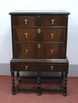 A XVII Century and Later Walnut Chest on Stand, the crossbanded top with two small and two long