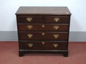 A Late XIX Century Oak Chest of Drawers, the moulded top over two short and three long drawers on